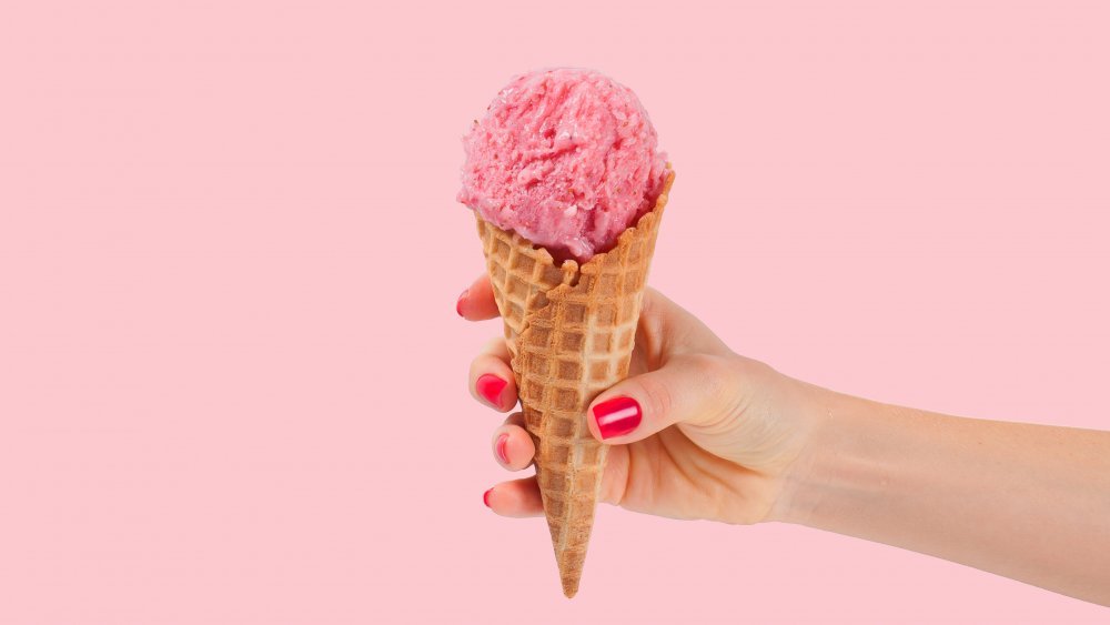 Hand holding ice cream