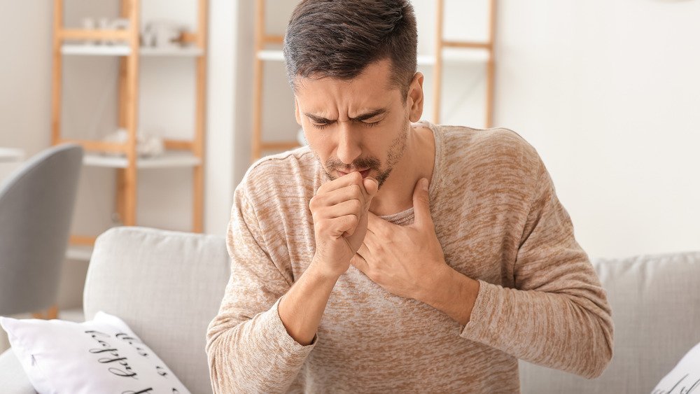 homme malade à la maison